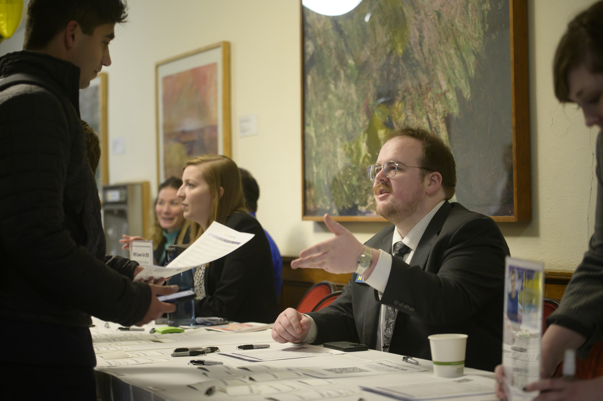 A UMSI student interviews with a recruiter at the UMSI Career Fair